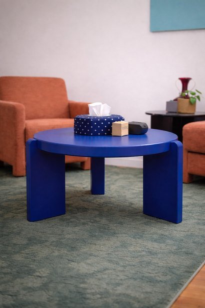 Cobalt side table in a treatment room