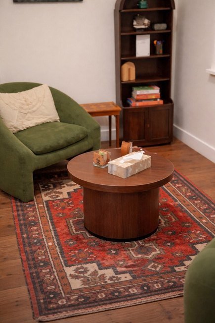 Walnut side table in a treatment room